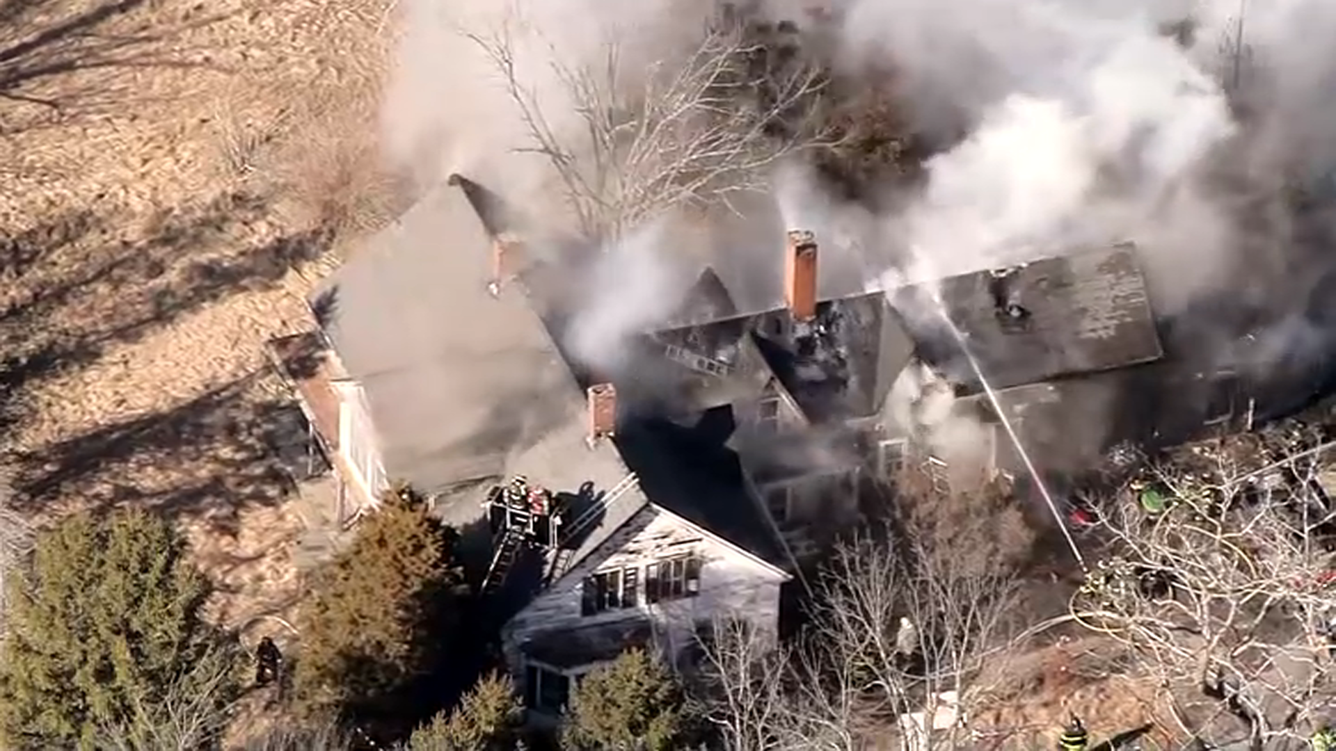 Smoke pouring from a burning house in Middleborough, Massachusetts, on Tuesday, March 11, 2025.