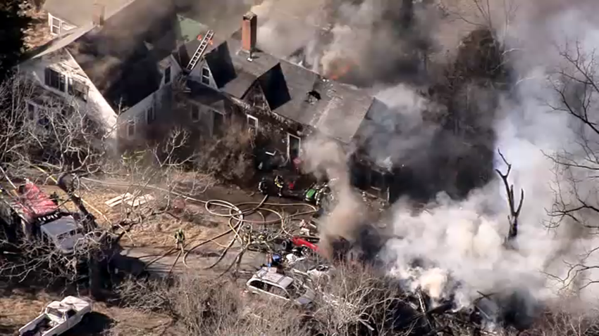 A house fire in Middleborough, Massachusetts, burning on Tuesday, March 11, 2025.