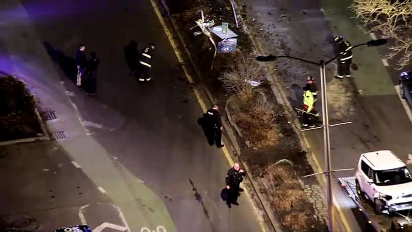 The aftermath of a rollover crash late Monday, March 4, 2025, in Salem, Massachusetts. The SUV that crashed had been stolen, police say, and the three teenagers inside are facing charges.