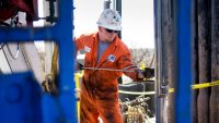 An operator for Baker Hughes conducts a wireline survey on a Chesapeake Energy natural gas rig in the North Texas Barnett Shale near Burleson, Texas.