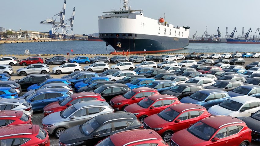 New cars wait for shipment in a port in Yantai in east China’s Shandong province Friday, April 11, 2025. 