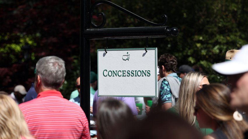 Patrons line up for concessions at the Masters