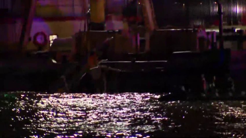 Crews pulled helicopter wreckage from the Hudson River