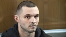 FILE - U.S. Army Staff Sgt. Gordon Black sits in a glass cage in courtroom in Vladivostok, Russia, on June 6, 2024. (AP Photo, File)