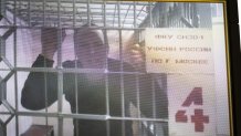 FILE - U.S. citizen Joseph Tater, who was detained for 15 days on charges of minor disorderly conduct in mid-August and then detained for a further two months on charges of attacking a police officer, is seen in a video link provided by the Russian Federal Penitentiary Service in the Moscow's City Court in Russia on Sept. 26, 2024. (AP Photo/Alexander Zemlianichenko, File)