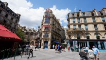 Guests stroll through the streets of The Wizarding World of Harry Potter – Ministry of Magic