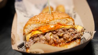 NEW YORK, NEW YORK – OCTOBER 13: A detailed view of Nowon’s Burger during Food Network New York City Wine & Food Festival presented by Capital One – Blue Moon Burger Bash presented by Pat LaFrieda Meats hosted by Rachael Ray at Pier 86 on October 13, 2023 in New York City. (Photo by Jeff Schear/Getty Images for NYCWFF)