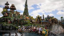 Guests ride the Hiccup's Wing Gliders rollercoaster