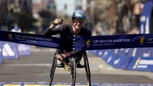 Boston, MA - April 21: Men's wheelchair winner Marcel Hug crosses the finish line during the 129th Boston Marathon on April 21, 2025. (Photo by Jessica Rinaldi/The Boston Globe via Getty Images)