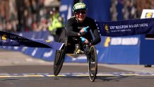 Susannah Scaroni of the United States crosses the finish line to win the 129th Boston Marathon Women's Wheelchair on April 21, 2025 in Boston, Massachusetts.