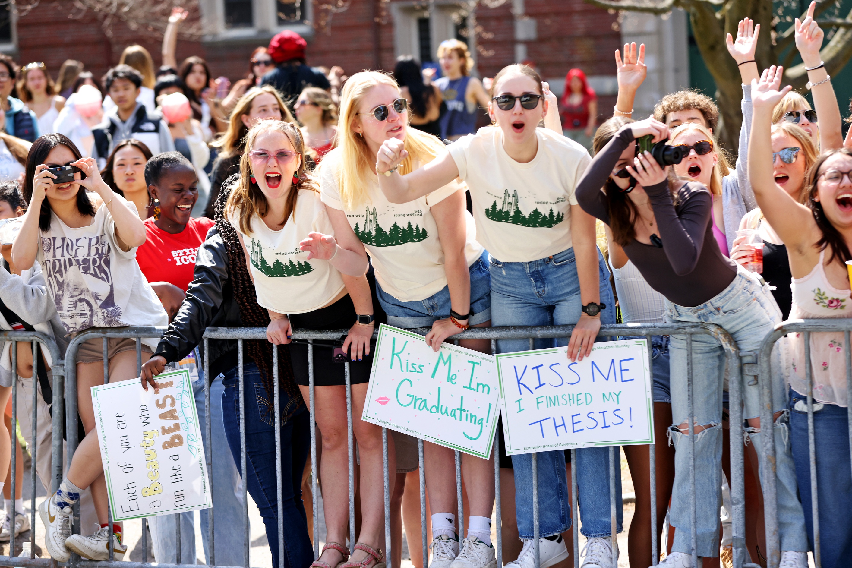 Apr 21, 2025; Boston, MA, USA; Spectators cheer from the side of the road during the 2025 Boston Marathon. Mandatory Credit: Paul Rutherford-Imagn Images