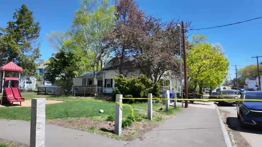 Police tape up on Lake Avenue in Manchester, New Hampshire, amid an investigation into a dog attack at a home there on Wednesday, April 30, 2025.