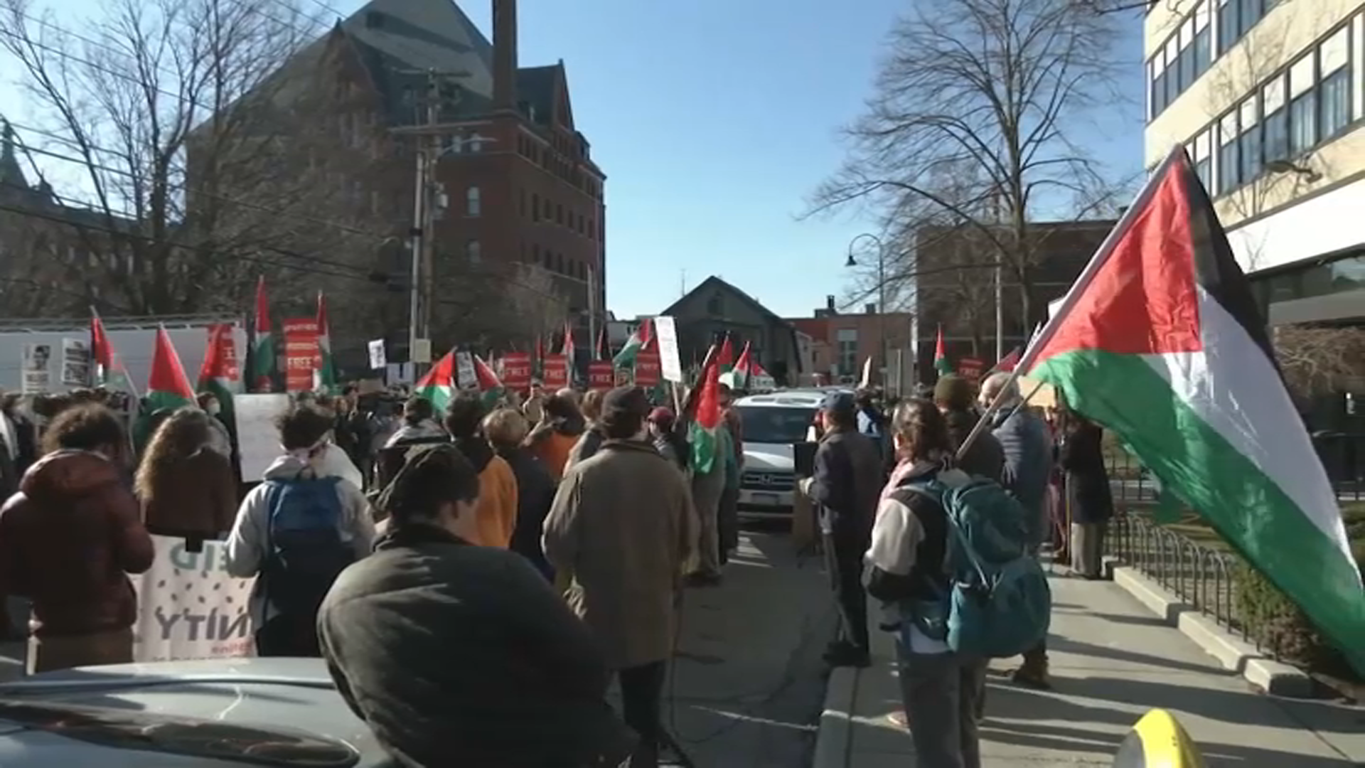 Protesters supporting Tufts graduate student Rumeysa Ozturk, many holding Palestinian flags, outside the federal courthouse in Burlington, Vermont, where she was having a hearing on Monday, April 14, 2025.