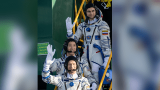 Roscosmos cosmonaut Sergey Ryzhikov, bottom, NASA astronaut Jonny Kim, middle, and Roscosmos cosmonaut Alexey Zubritskiy, top.