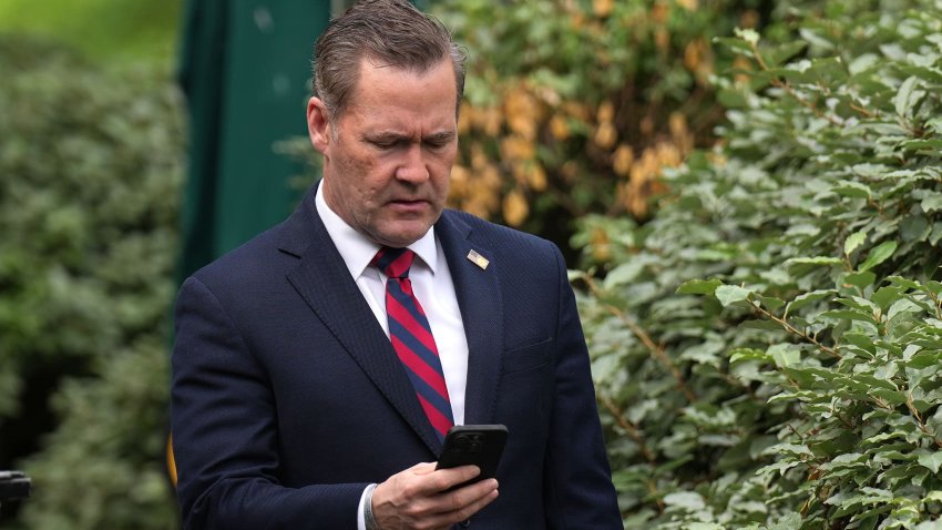 National Security Advisor Michael Waltz looks at his phone as he prepares for a TV interview at the White House on May 01, 2025 in Washington, DC. This week marks the first 100 days of U.S. President Donald Trump’s second term.