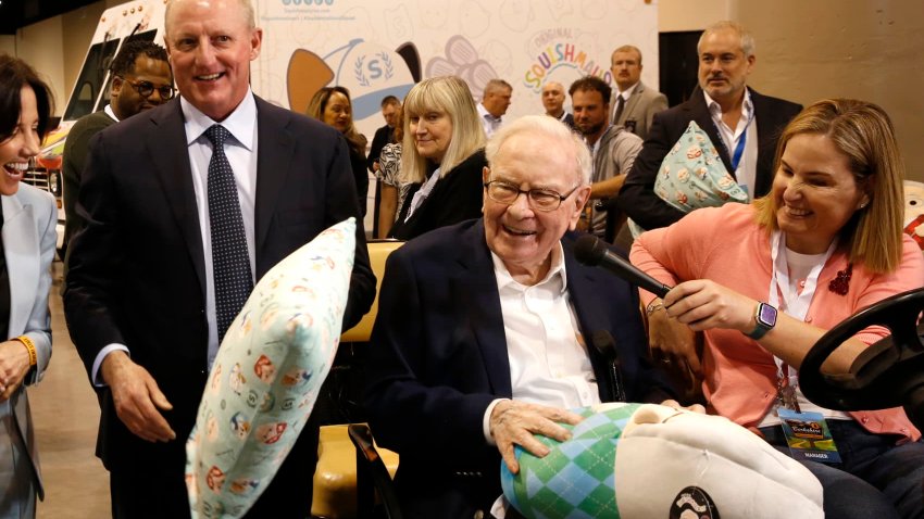 Warren Buffett and Greg Abel walkthrough the Berkshire Hathaway Annual Shareholders Meeting in Omaha, Nebraska on May 3, 2025.