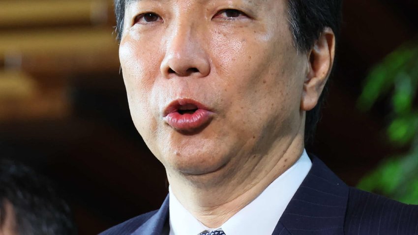 Japan’s farm minister Taku Eto responds to questions from media after submitting his resignation to Prime Minister Shigeru Ishiba at the prime minister’s office in Tokyo on May 21, 2025.