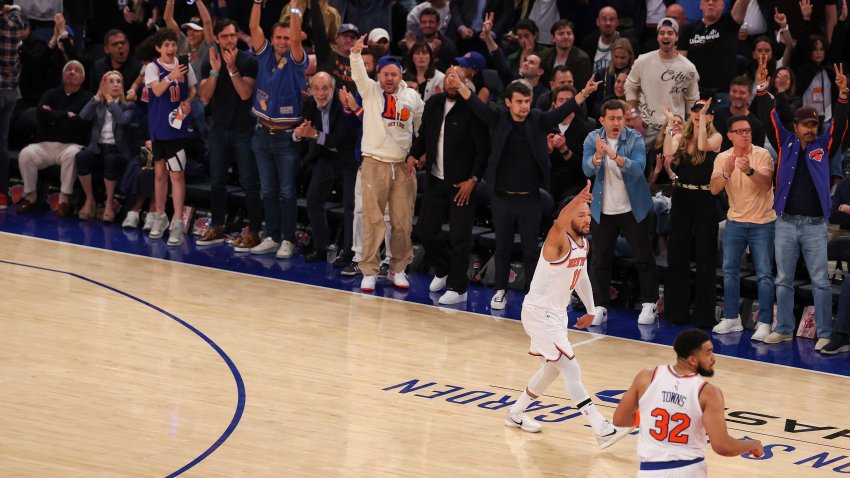 Jalen Brunson of the New York Knicks celebrates a three-point basket