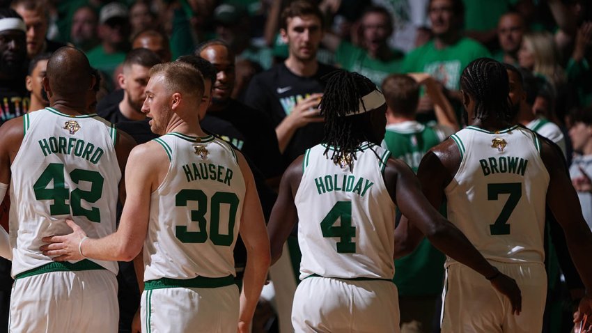 Celtics teammates Al Horford, Sam Hauser, Jrue Holiday and Jaylen Brown
