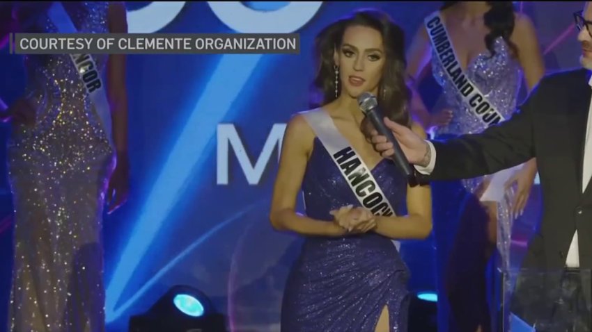 Jordon Hudson onstage during the Miss Maine USA competition on May 11, 2025. She wears a blue evening gown.