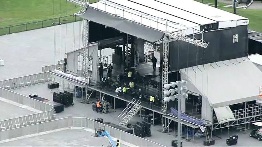 Crews setting up a stage for the Boston Calling 2025 music festival.