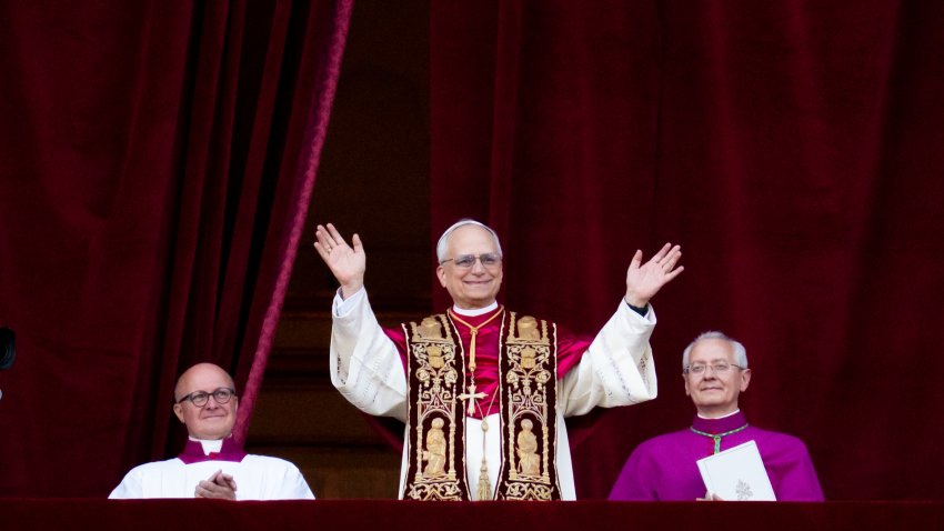 Newly elected Pope Leo XIV, Robert Prevost, arrives on the main central loggia balcony of St. Peter’s Basilica for the first time after the cardinals end the conclave in The Vatican, on May 8, 2025. (Photo by Massimo Valicchia/NurPhoto via Getty Images)