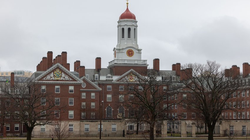 CAMBRIDGE, MASSACHUSETTS – MARCH 17: A person runs past Dunster House at Harvard University on March 17, 2025 in Cambridge, Massachusetts. Harvard University announced free tuition for students from families that make under $200K a year. (Photo by Scott Eisen/Getty Images)