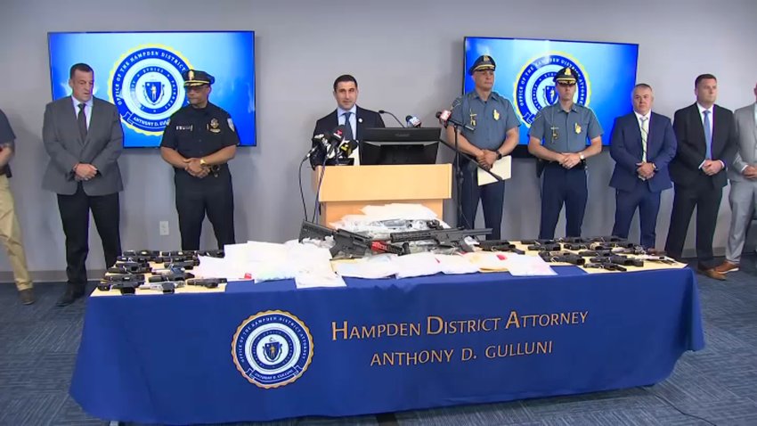 The Hampden County District Attorney, flanked by law enforcement partners, details three recent drug investigations in his region.