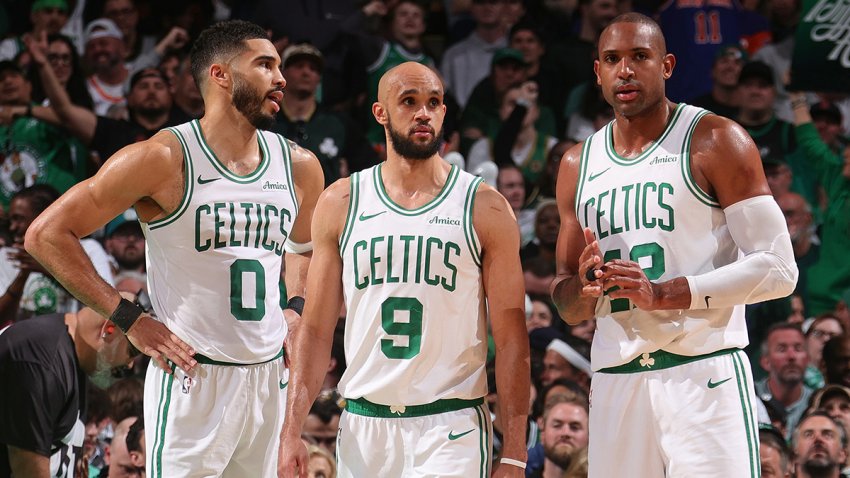Celtics teammate Jayson Tatum, Derrick White and Al Horford