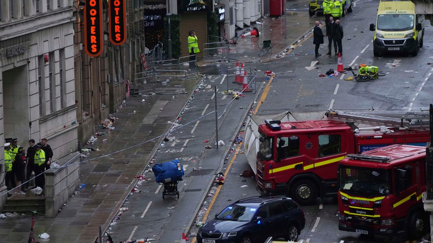 The scene after a car collided with pedestrians during the Premier League winners parade in Liverpool, England, Monday, May 26, 2025.