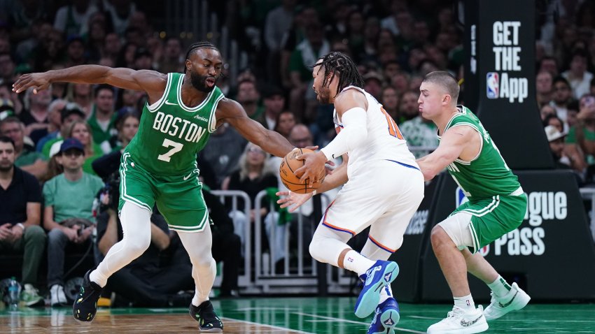 Oct 22, 2024; Boston, Massachusetts, USA; Boston Celtics guard Jaylen Brown (7) steals the ball from New York Knicks guard Jalen Brunson (11) in the second quarter at TD Garden. Mandatory Credit: David Butler II-Imagn Images