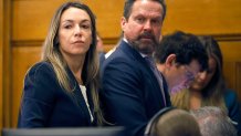 Karen Read and attorney Alan Jackson look at the empty jury box while listening to Judge Beverly Cannone on Wednesday May 21, 2025.