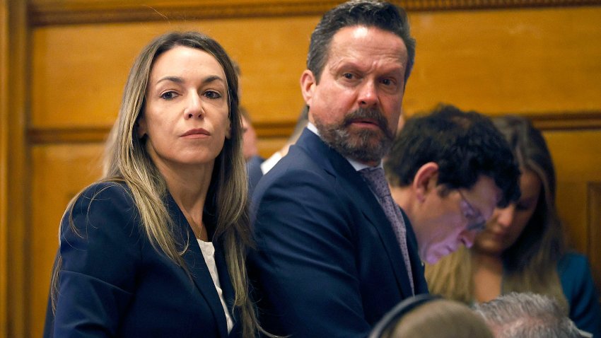 Karen Read and attorney Alan Jackson look at the empty jury box while listening to Judge Beverly Cannone on Wednesday May 21, 2025.