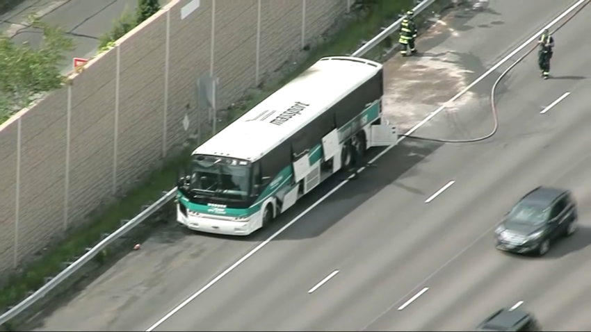 A Logan Express bus pulled over on I-93 in Medford, Massachusetts, on Friday, May 30, 2025.