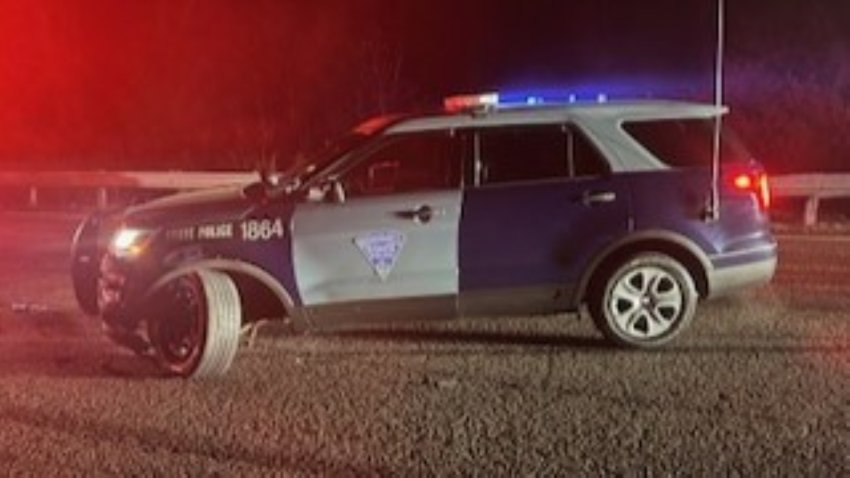 A damaged Massachusetts State Police cruiser after a crash on I-93 in Milton on Saturday, May 3, 2025.