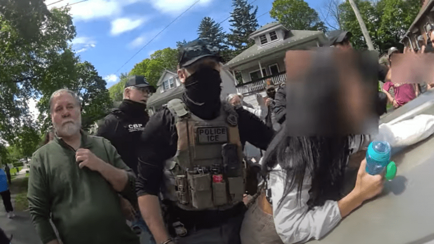 A still from Worcester police body camera footage showing ICE officers and people in the city reacting to an operation on Thursday, May 8, 2025.
