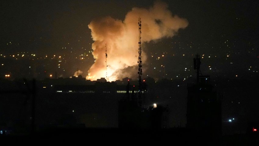 Smoke rises up after an explosion in Tehran, Iran, Friday, June 13, 2025.