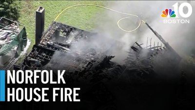Two firefighters suffer heat exhaustion battling Norfolk blaze