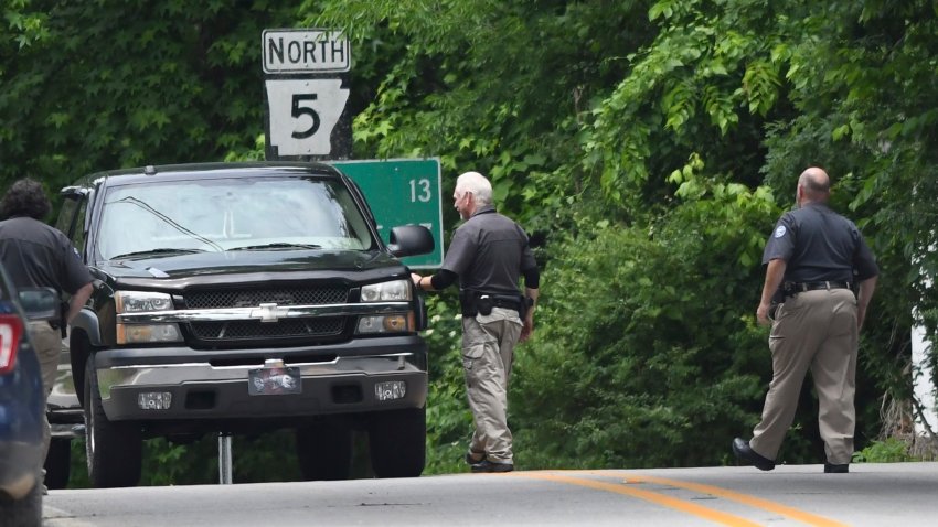 Police set up checkpoints looking for escaped prisoner Grant Hardin, Thursday, May 29, 2025, near downtown Calico Rock, Ark.