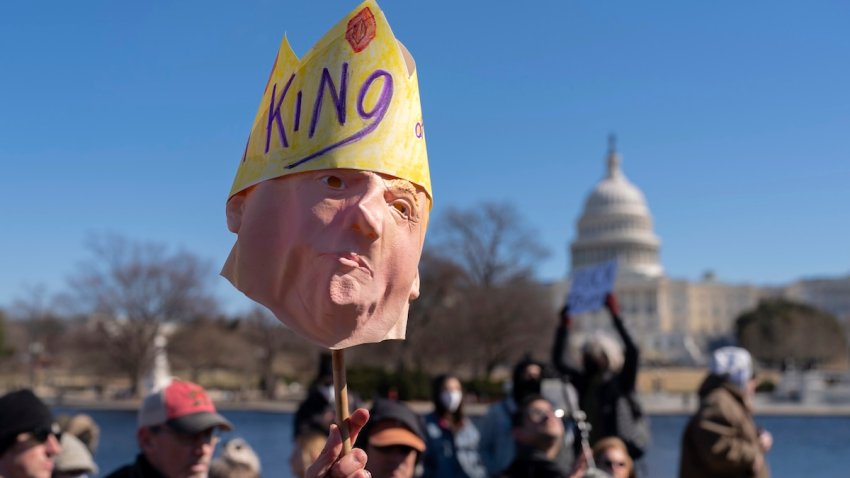 FILE – People take part in the “No Kings Day” protest on Presidents Day in Washington, in support of federal workers and against recent actions by President Donald Trump and Elon Musk, Monday, Feb. 17, 2025, by the Capitol in Washington.