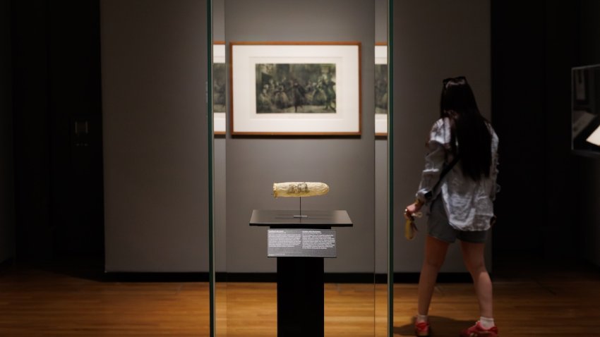 This image made available by the Rijksmueum shows a condom with print, circa 1830, displayed at Amsterdam’s Rijksmuseum.