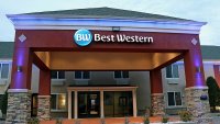 Best Western hotel showing lighted logo above entrance at dusk, The company is headquartered in Phoenix Arizona. This particular hotel is in the Tulsa, Oklahoma. (Photo by: Don and Melinda Crawford/UCG/Universal Images Group via Getty Images)