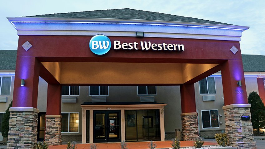 Best Western hotel showing lighted logo above entrance at dusk, The company is headquartered in Phoenix Arizona. This particular hotel is in the Tulsa, Oklahoma. (Photo by: Don and Melinda Crawford/UCG/Universal Images Group via Getty Images)