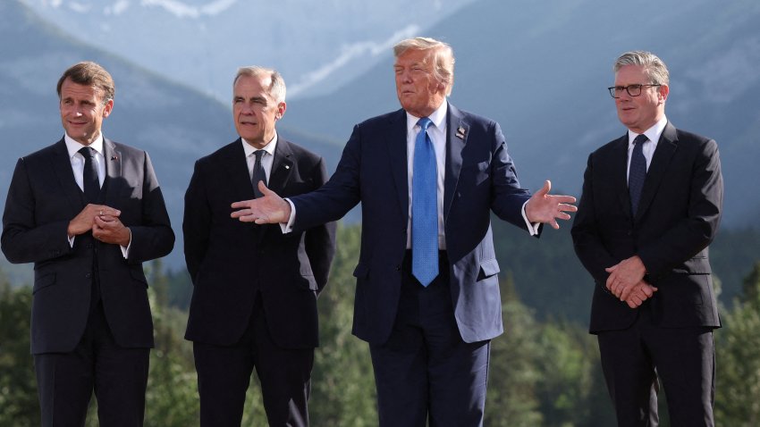 French President Emmanuel Macron, Canadian Prime Minister Mark Carney, US President Donald Trump and British Prime Minister Keir Starmer pose for a family photo during the Group of Seven (G7) Summit at the Kananaskis Country Golf Course in Kananaskis, Alberta, Canada on June 16, 2025.
