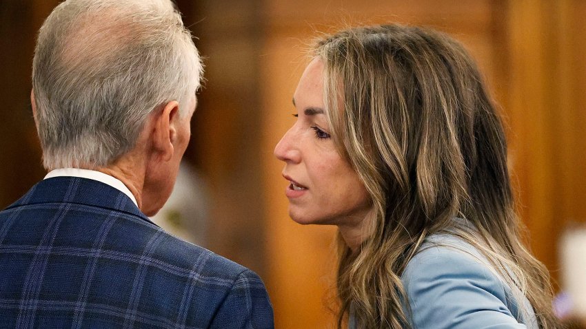 Karen Read, right talks with her parents, William and Janet Read, during a break in her murder trial proceedings at Norfolk Superior Court in Dedham, Massachusetts, on Wednesday, June 4, 2025.