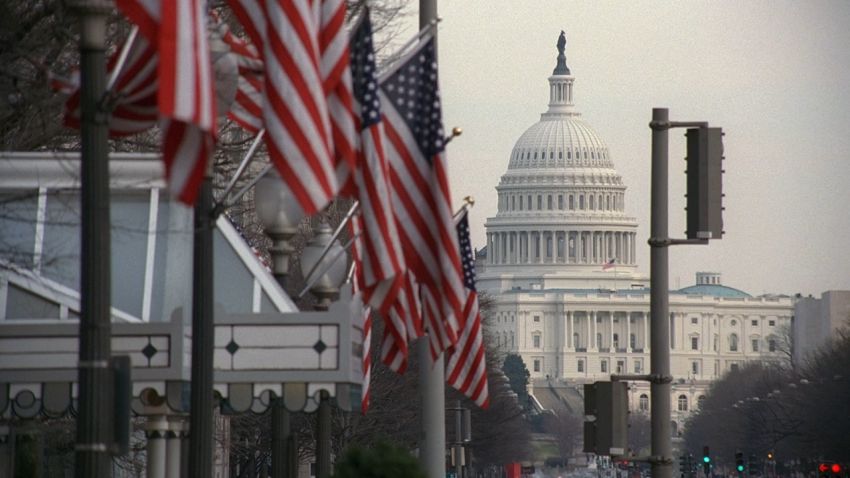 White House in background with row of American flags