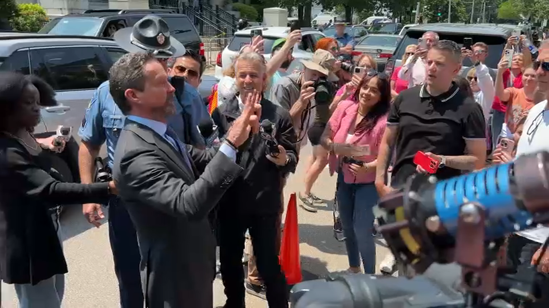 Karen Read attorney Alan Jackson speaks to a group of her supporters outside of Norfolk Superior Court in Dedham, Massachusetts, on Friday, June 13, 2025.
