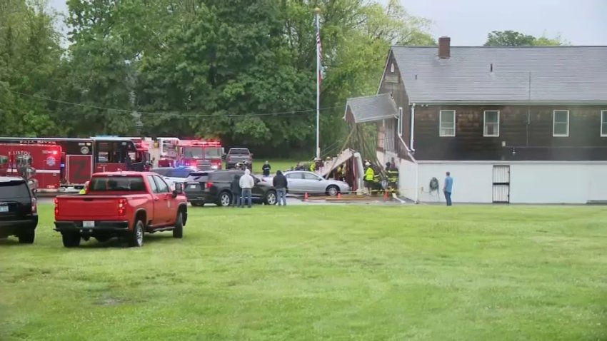 Firefighters on scene at the Portuguese American Club in Portsmouth, Rhode Island, for a partial building collapse on June 7, 2025. (WJAR)