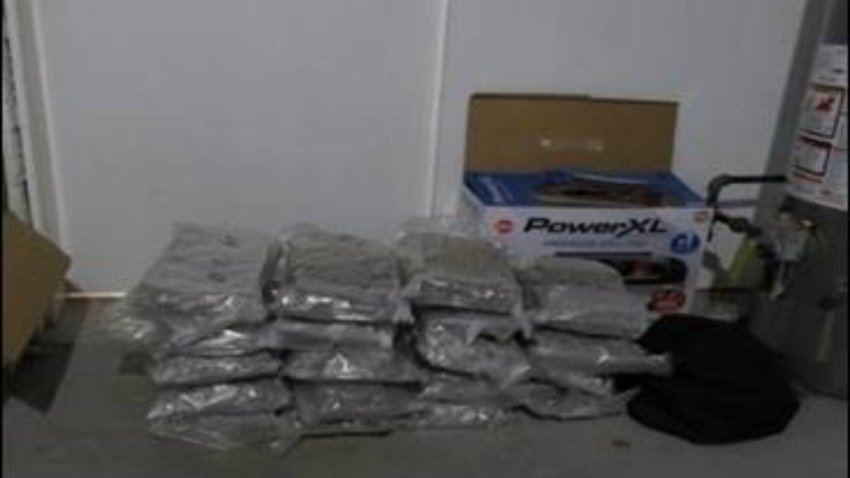 Federal prosecutors say this photo shows 50 kilograms of marijuana allegedly seized from the home of Peng Lian Zhu in Melrose, Massachusetts.
