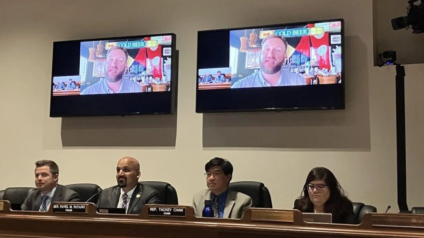 Sen. Julian Cyr testifies virtually on his happy hour bill from Provincetown Brewing Co. during a Joint Committee on Consumer Protection and Professional Licensure hearing on Monday, July 7, 2025, as co-chairs Sen. Pavel Payano and Rep. Tackey Chan listen from the State House.